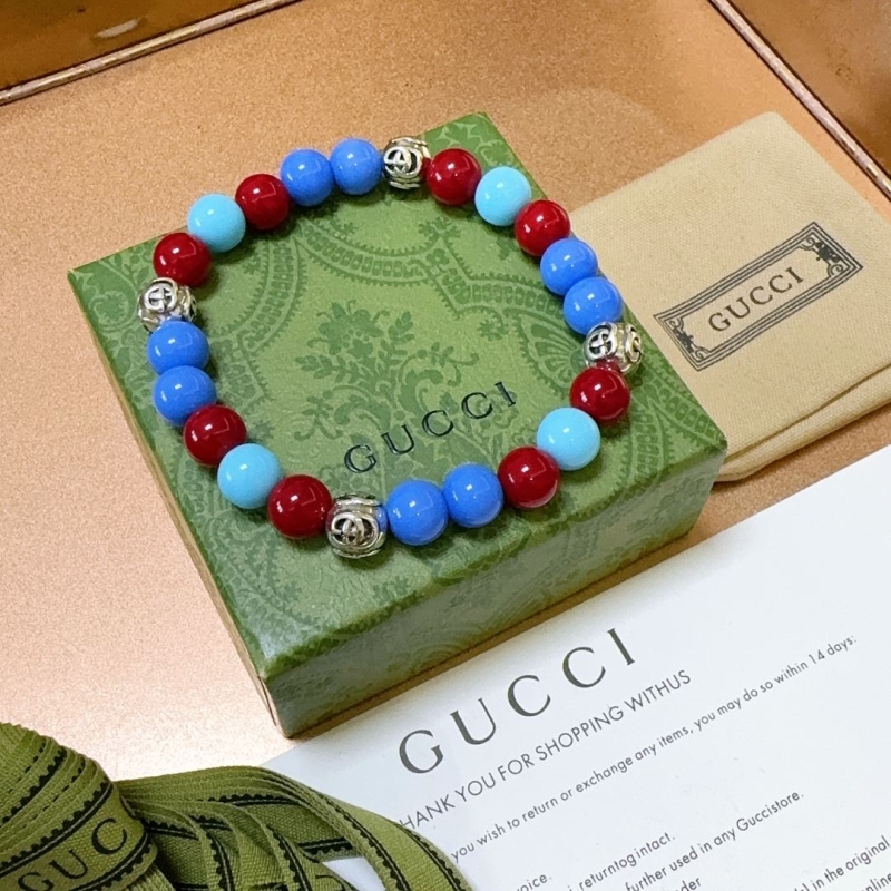 G*u*i bracelets